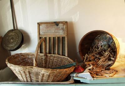 Kitchen antiques (basket, corn popper, laundry)