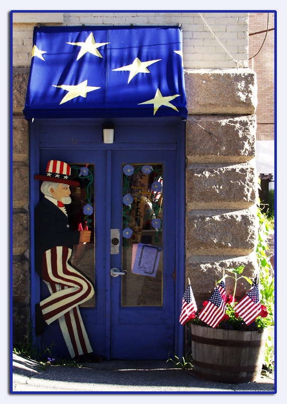 Uncle Sam stands guard outside coffee shop in Bath, Maine.