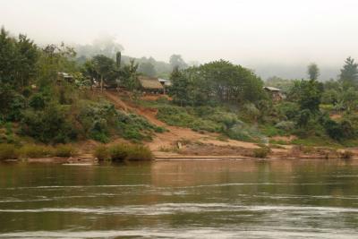 Misty village along the Mekong