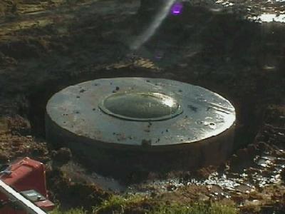 Tank in hole