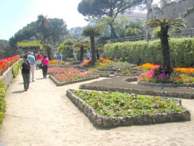 The terrace gardens of the Villa Rufolo in Ravello. Judy is walking away. The villa is in the upper right corner. 2