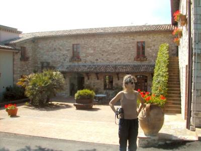 Judy in front of the Hotel Bramante near Todi in Umbria. We stayed here. Originally the hotel was a 12th century convent.