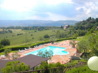 The hotel pool and Umbrian countryside as seen from the grounds of the Hotel Bramante