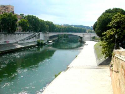 From Ponte Fabricio: Left - Isola Tiberina (Tiber Island) in Tiber River. Island strategically important since ancient times.