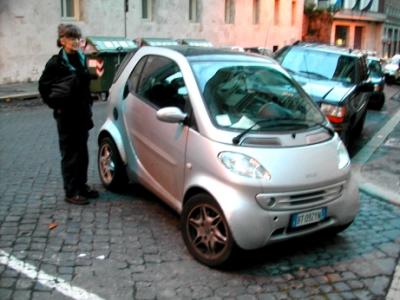 Judy next to the tiny Smart car. We saw lots of these cars throughout Italy.