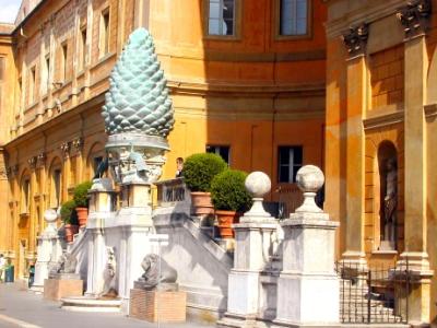 Cortile della Pigna: Bronze pine cone - from ancient Roman fountain - symbolizes a welcome. Niche by Ligorio in mid 1500's.