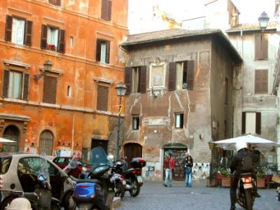Small street-plaza next to Campo de' Fiori showing a fresco on an old residence