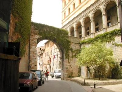 Medieval arch over a street in Assisi