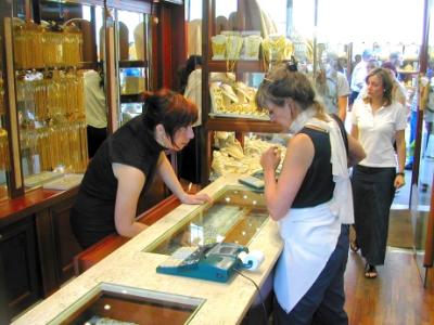 Judy buying jewelry in a shop on the Ponte Vecchio