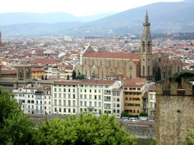 Church of Santa Croce (1290's) seen from Piazzale Michelangelo - white neo-Gothic facade (1850's) of church is on left side.