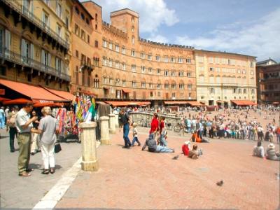 Piazza del Campo (12 c.), Fonte Gaia (15th c. fountain) and Palazzo Sansedoni - building with a curved facade (13th c.)