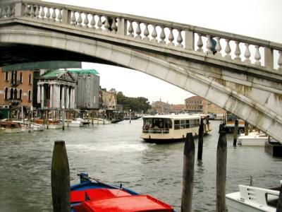 A waterbus (vaporetto) in the Grand Canal and part of the Ponte degli Scalzi. Photo from in front of the Hotel Bellini.