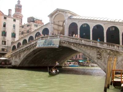 The Rialto Bridge over the Grand Canal. The bridge was built in the late 1500's. It is lined with shops.