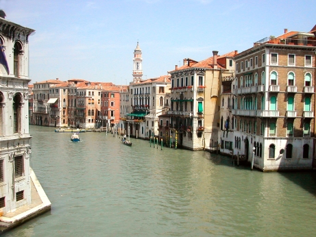 Grand Canal from the Rialto Bridge, looking north. Baroque tower (1600s) of the Church of the Santi Apostoli (6th c.) is seen.