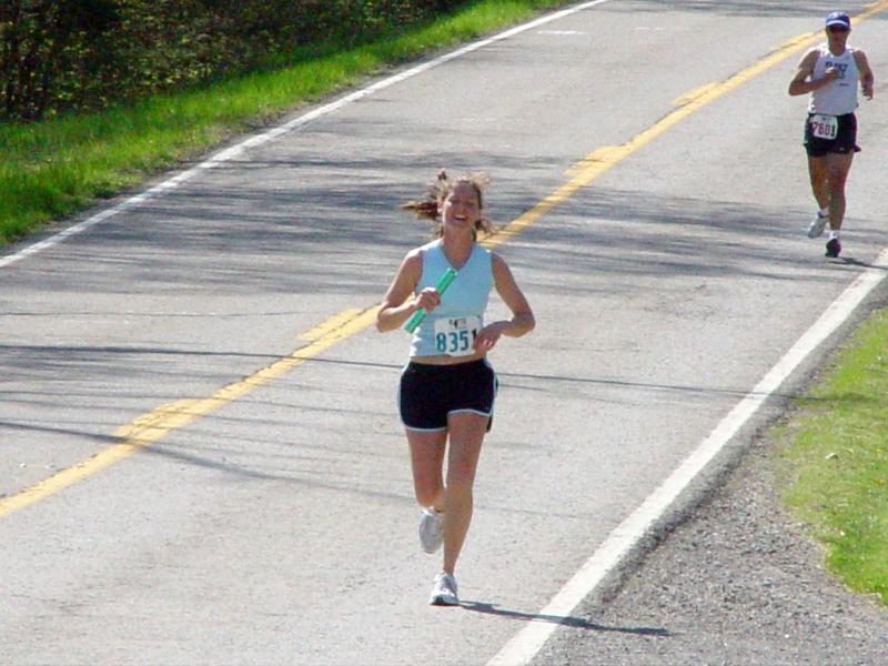 Stephanie running the 17th leg