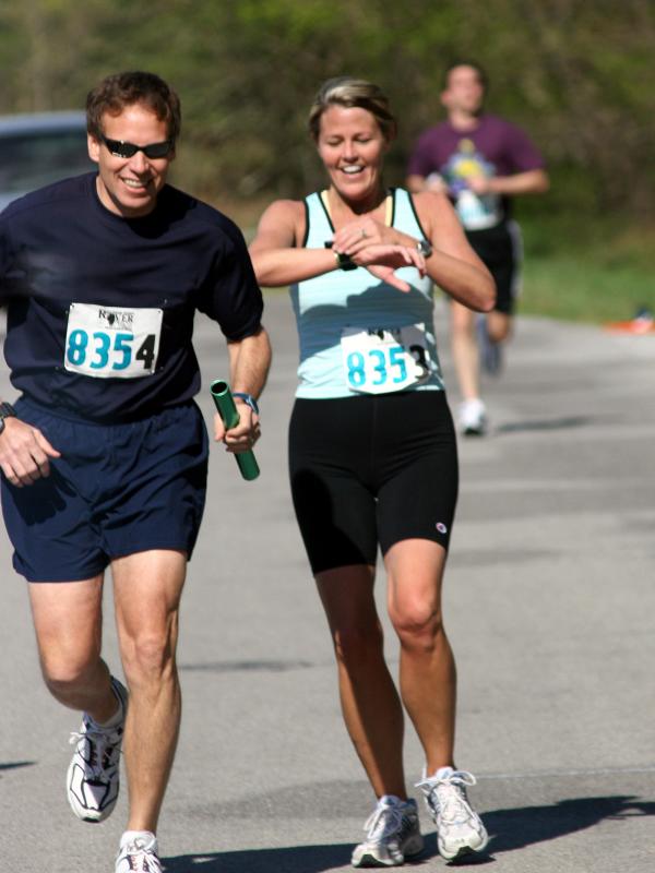 Meg handing off to Garry at 3rd exchange