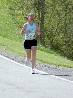 Stephanie running the 17th leg
