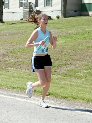 Stephanie running the 17th leg