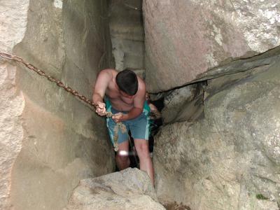 Taking a bath down in a cave hidden in a little glen