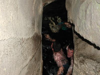 Taking a bath down in a cave hidden in a little glen