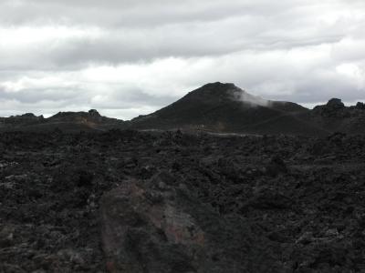 Dark, dead and stony volcano-landscape