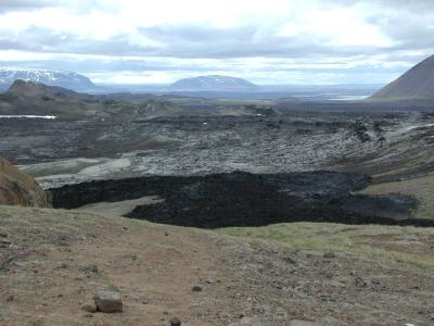 Dark, dead and stony volcano-landscape