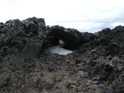 Dark, dead and stony volcano-landscape