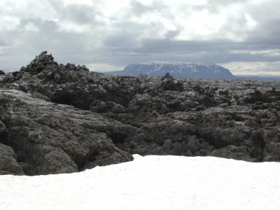 Dark, dead and stony volcano-landscape
