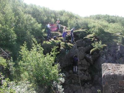 Climbing in the wall of rocks