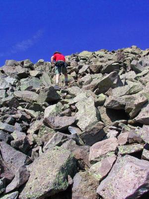 Dick Scrambling to The Top of The Pyramid