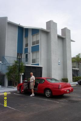 Just over my head is the entrance to the two-story townhouse   27chrisbycar.jpg