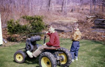 My younger brother, and me on the tractor!
