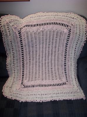 View showing the whole blanket (it is really a rectangle, although this pose makes it appear a more hour-glass shape.