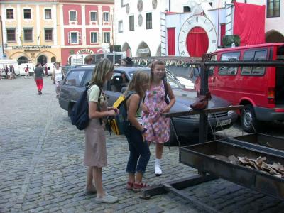 3 girls admire a pigs head