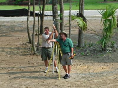Chad and Randy check the grading 08/07/2002