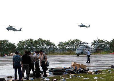 helicopters aid tsunami victims