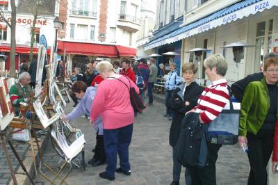 Debra and Rita check out the artwork while Mimi and Trudy watch