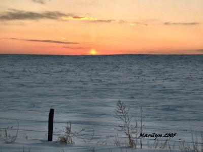 'sea of snow ... setting sun'