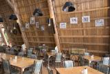 The Shaapuhtuuwan Dining Hall includes portraits of local elders and land.