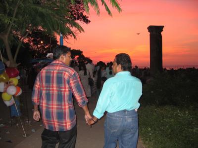 hand-holding at sunset