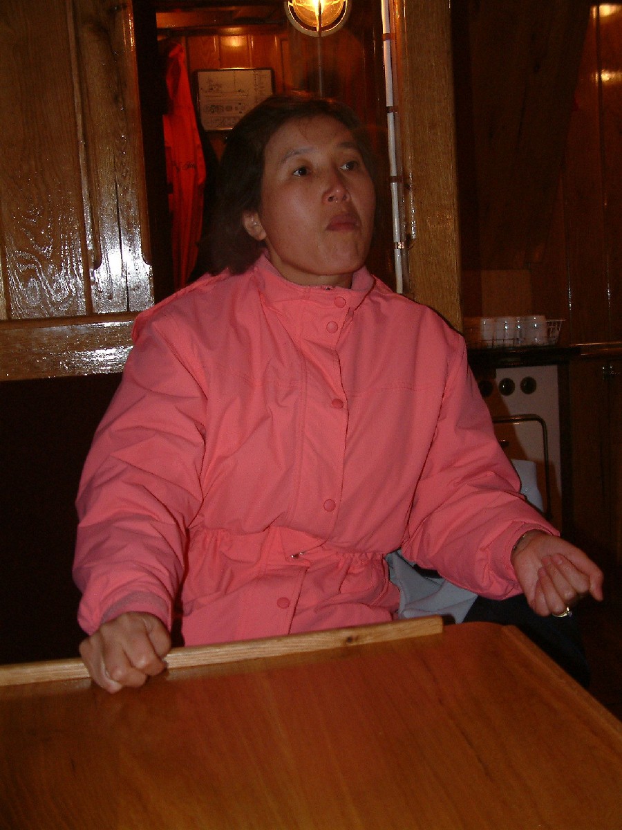 Misook warms up in the ships cabin