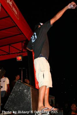 Kawkaw sprays the crowd with his beer