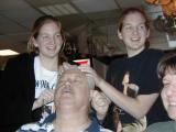 Danielle and Lisa give Grandpa Tony an Ear Massage