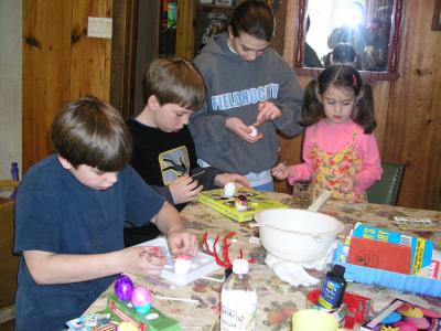 Kevin, Nick, Emily, and Sarah Coloring Easter Eggs