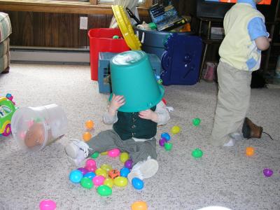 Ryan playing with the Easter Egg Bucket