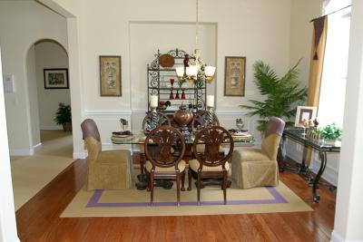 Dining room. The archway to the left leads to the office and guest bathroom. To the left of this picture is the hallway leading to the kitchen.