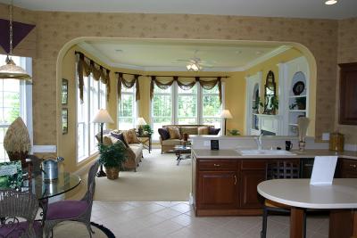 View of family room from arch of formal living room.