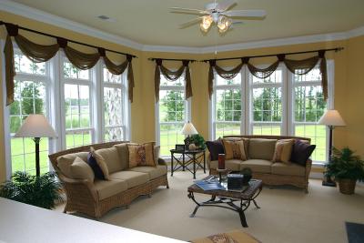 Family room from kitchen. View out windows will be of the 7th fairway.