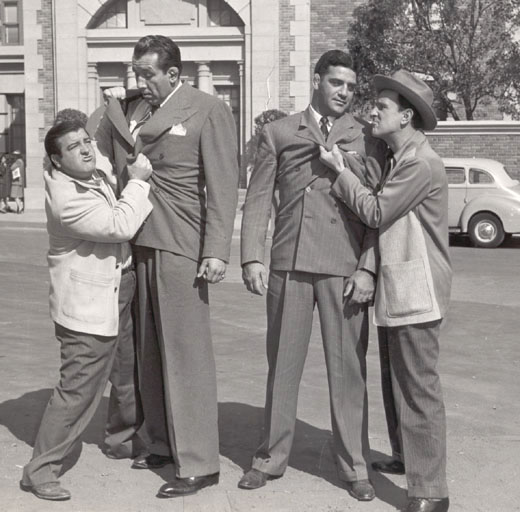 Here he is with Abbott and Costello
