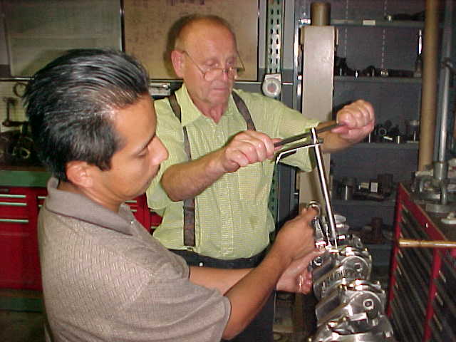 Torquing the rod bolts.